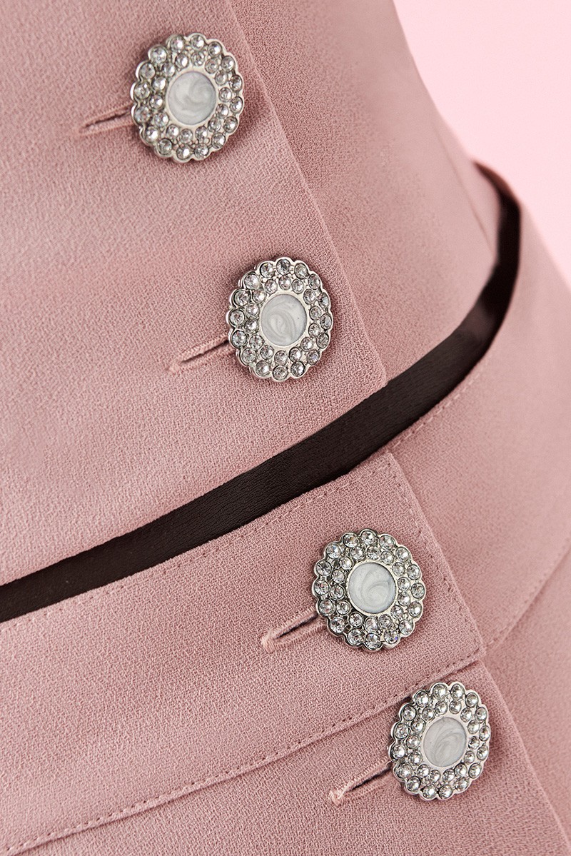 Conjunto de fiesta top corto con manga abulonada y falda recta con botones joya rosa para invitadas boda comunion bautizo